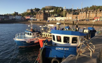 sunset oban seaside town