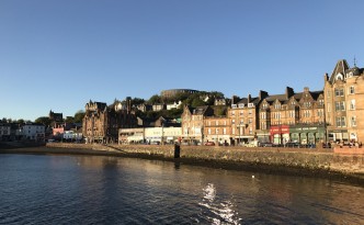 sunset oban seaside town