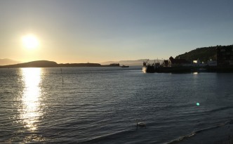 sunset oban seaside town