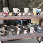 Buying wabi-sabi cups from a handmade pottery shop in Uji